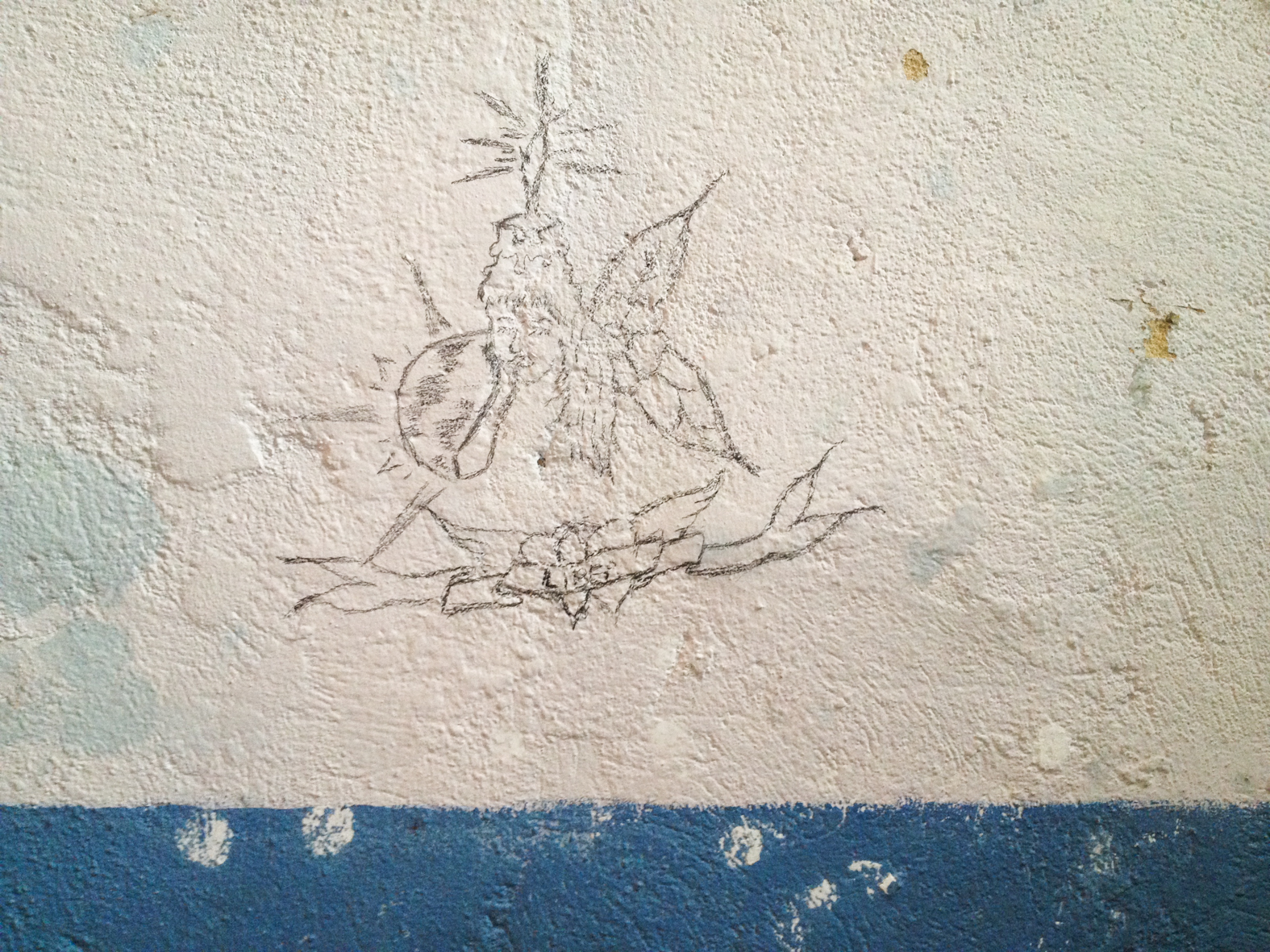 Graffiti sur le mur d'une cellule